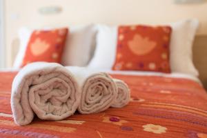 Postel nebo postele na pokoji v ubytování Hotel Giove dipendenza Hotel Fiamma