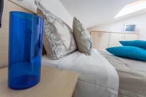 Postel nebo postele na pokoji v ubytování Hotel Giove dipendenza Hotel Fiamma