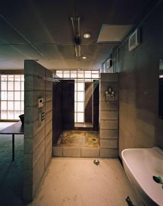 Vonios kambarys apgyvendinimo įstaigoje HOTEL SUNSHINE/三舎院
