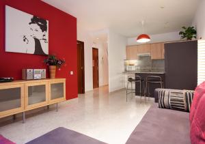 A kitchen or kitchenette at Portal Del Angel Barcelona Apartment