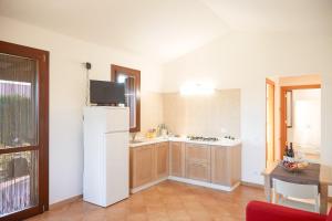 A kitchen or kitchenette at Residence I Faraglioni
