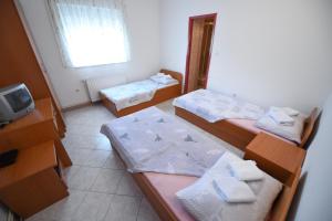 Katil atau katil-katil dalam bilik di Restoran i sobe Venezia