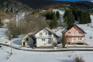 an aerial view of a house in the snow at Kuća za odmor ANA in Kupres