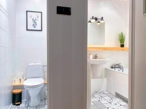 Kúpeľňa v ubytovaní Apartament Dzień Dobry 2