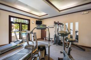 a gym with treadmills and exercise bikes in a room at Cayuga Blu in Ithaca