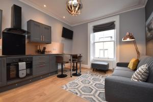Η κουζίνα ή μικρή κουζίνα στο Signature Apartments +51 φωτογραφίες