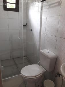 Ванная комната в Chale Das Flores