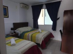 Ліжко або ліжка в номері Hotel Valeritos