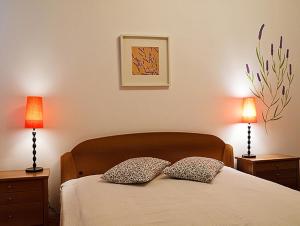 Posteľ alebo postele v izbe v ubytovaní Kredo B&B
