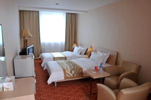 Postel nebo postele na pokoji v ubytování Springs Hotel Ulaanbaatar