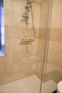 Ванная комната в COL DE RIF Appartamento Storico nelle Dolomiti