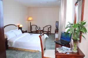 Postel nebo postele na pokoji v ubytování Springs Hotel Ulaanbaatar