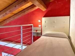 Gioia Guesthouse tesisinde bir odada yatak veya yataklar