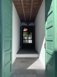 an open door to a room with a window at Casa Emblemática Don Gabriel in Santa Cruz de la Palma