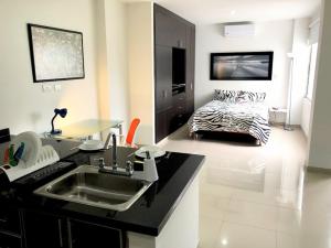 Voodi või voodid majutusasutuse Apartaestudio Arboleda del Ingenio toas