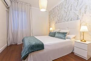 Posteľ alebo postele v izbe v ubytovaní Exclusive Apartments Street Beatas