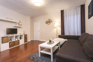 Televízia a/alebo spoločenská miestnosť v ubytovaní Exclusive Apartments Street Beatas
