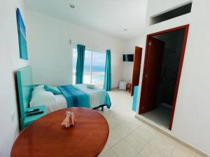 Posezení v ubytování Habitación Amanecer Turquesa #5