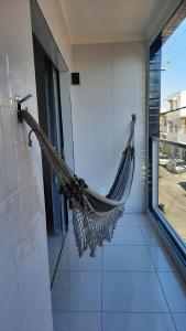 En balkon eller terrasse på Lindo Apartamento Varanda no centro de Paulo Afonso