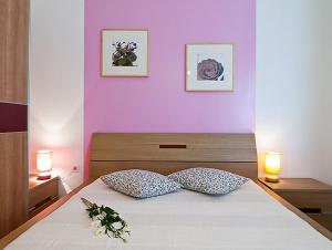 Posteľ alebo postele v izbe v ubytovaní Kredo B&B