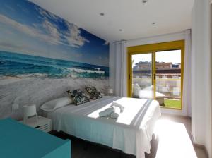 Postel nebo postele na pokoji v ubytování Lagos del Castillo Atico Duplex con piscina privada by costablancarent + 30 fotografií