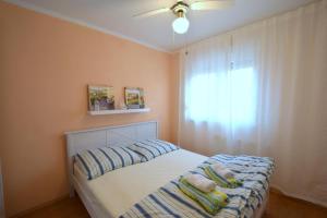 Posteľ alebo postele v izbe v ubytovaní Apartment Luis