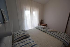 Posteľ alebo postele v izbe v ubytovaní Apartment Luis