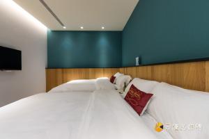 花蓮 Cozy Stay 舒適好宅房間的床