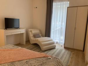TV a/nebo společenská místnost v ubytování Manland Vendégház Lillafüred