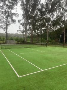 Tennis eller squash på eller i nærheten av Wallaby Cottage