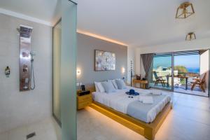 Postel nebo postele na pokoji v ubytování Lilium Luxury Suites