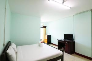 TV a/nebo společenská místnost v ubytování Eden Garden Resort