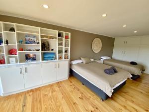 Voodi või voodid majutusasutuse The Views Cottage toas