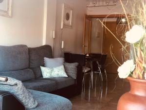 Posedenie v ubytovaní Apartamento con terraza y piscina en Malgrat de Mar