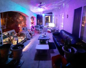 a living room with a couch and a table at CATmosphere 2 in Las Vegas