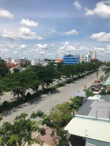 a view of a street in a city with buildings at Nhà Nghỉ LÂM ANH in Can Tho