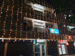 a building with christmas lights on the side of it at Hotel Victoria in Chandīgarh