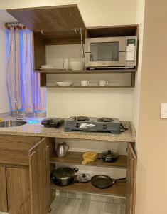 Kuchyň nebo kuchyňský kout v ubytování Hermosa Habitación cerca al Centro histórico