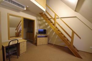 Telewizja i/lub zestaw kina domowego w obiekcie Hotel Vadászkürt Superior