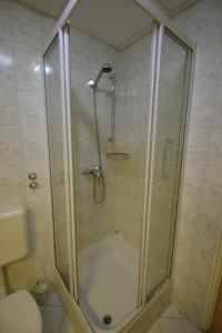 Łazienka w obiekcie Hotel Vadászkürt Superior