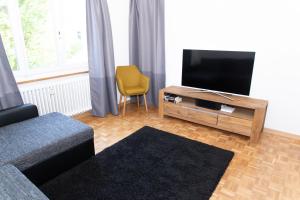 TV a/nebo společenská místnost v ubytování Armotti Apartments Friedheim