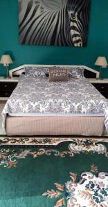 Ένα ή περισσότερα κρεβάτια σε δωμάτιο στο Dream Home