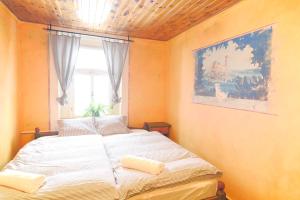 Postel nebo postele na pokoji v ubytování Hotel Plesivec