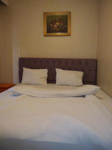 Postel nebo postele na pokoji v ubytování Taksim Şato Hotel