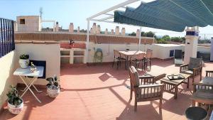 Balkón nebo terasa v ubytování Naufragos Beach Apartment