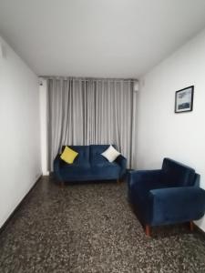 Posezení v ubytování Suite Trujillo