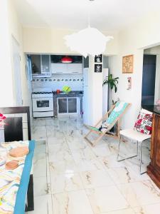 Η κουζίνα ή μικρή κουζίνα στο En el corazón de la romana con a/c, wifi, luz y gas incluido.