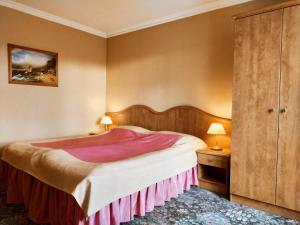 Postel nebo postele na pokoji v ubytování Hotel Polaris
