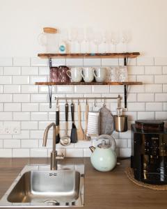 Een keuken of kitchenette bij Sohana Lifestyle Apartments I Leilani's & Saskia's Home I Rust