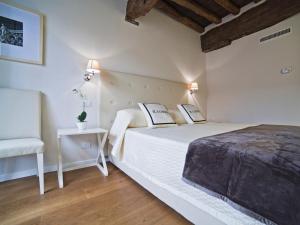 Postel nebo postele na pokoji v ubytování B&B Il Corso